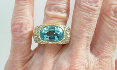 Vintage 14K Yellow Gold Blue Topaz and Diamond Ring - Closeup Hand View